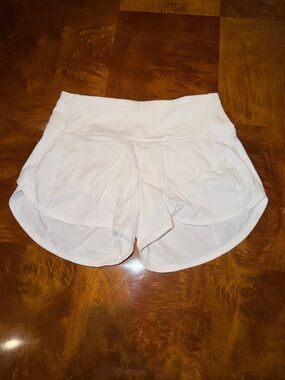 Lululemon White Athletic Shorts - 4 inch. Size Small